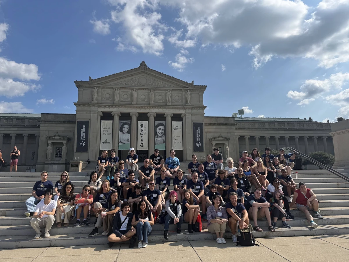 A Landmark student group on the steps of the Kenneth C. Griffin Museum of Science and Industry in Chicago