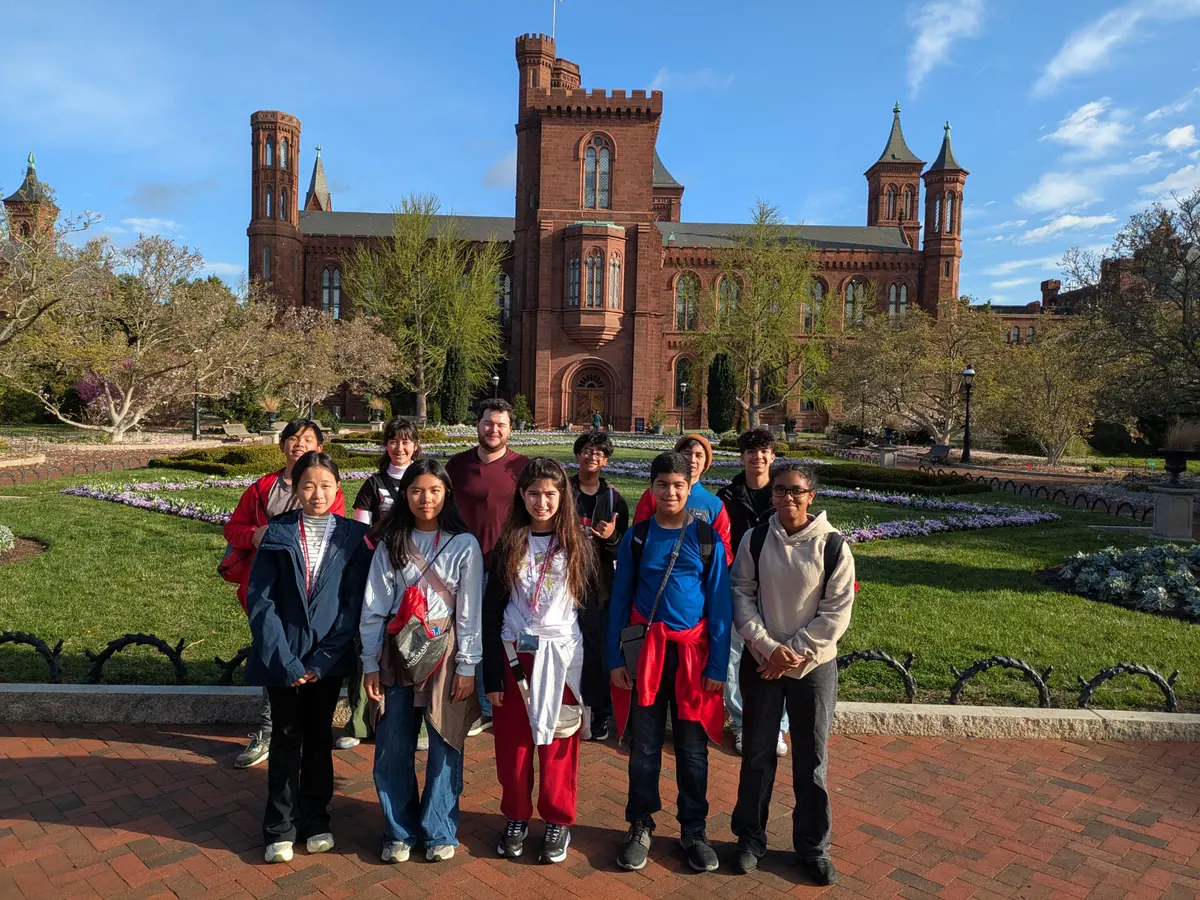 Landmark students in the garden in front of the Smithsonian Castle in Washington, DC