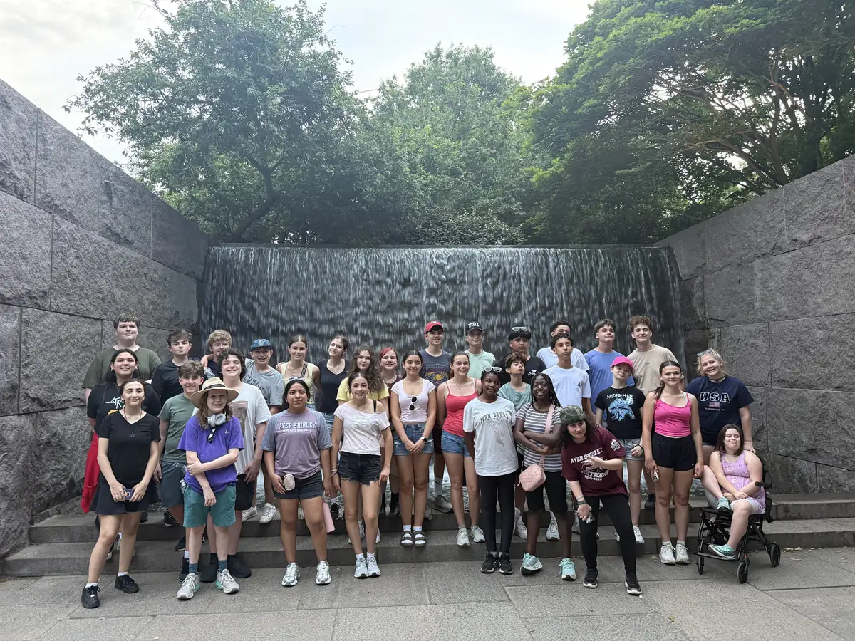 A Landmark student group gathered at the waterfall in the Franklin Delano Roosevelt Memorial on a Washington, DC school trip
