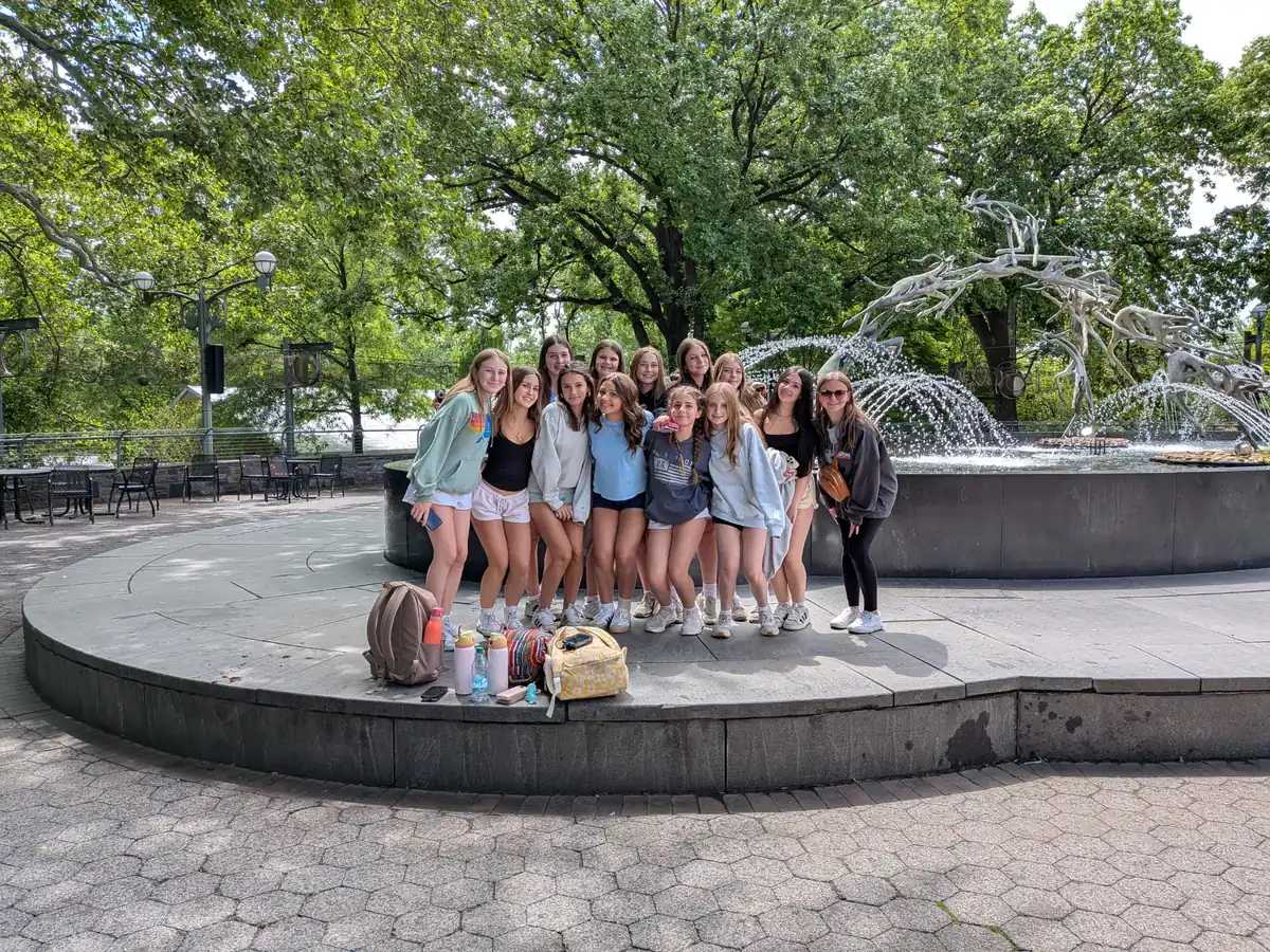 A Landmark student group photographed beside a fountain during a Philadelphia school trip