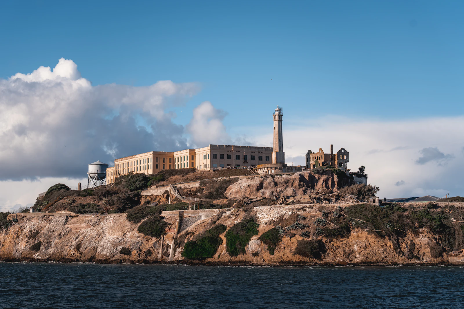 Alcatraz Island in San Francisco Bay under a blue sky