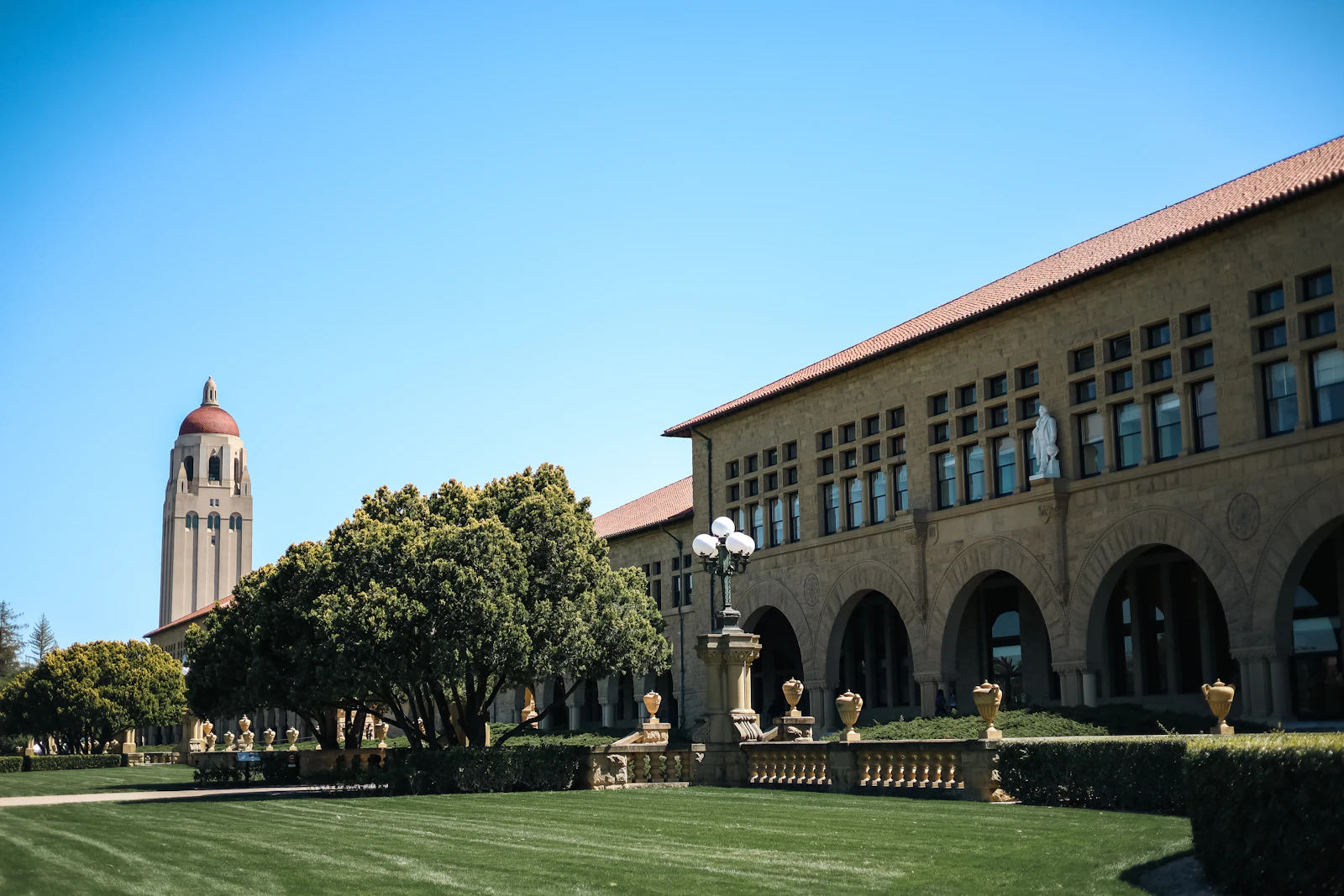 Hoover Tower rising above the sandstone arcades of Stanford University