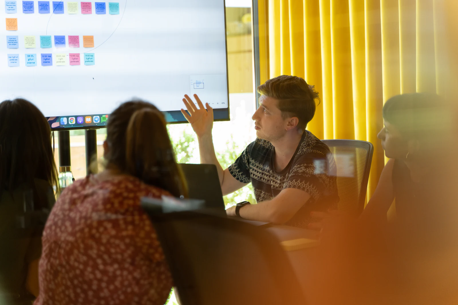 A presenter pitching to an engaged audience