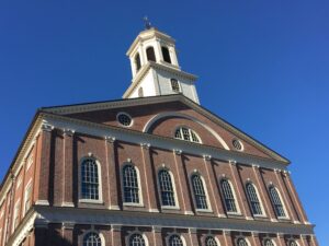 Faneuil Hall with a blue sky background
