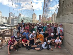Students at the Brooklyn Bridge in New York City.