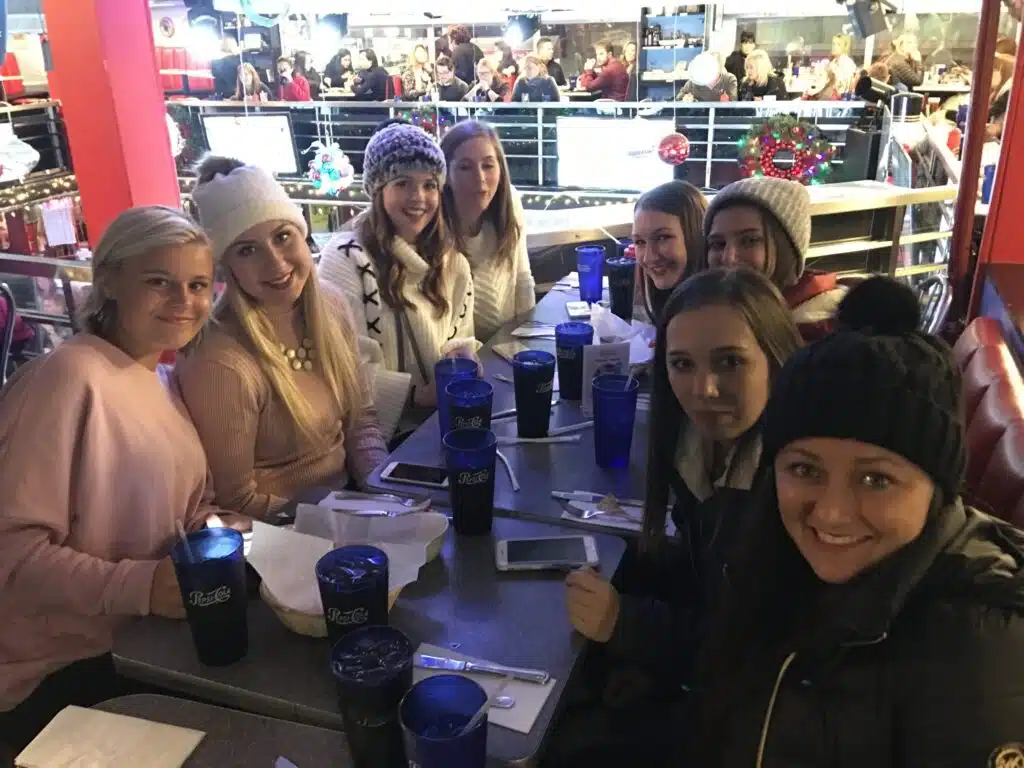 group of students at dinner at NYC resturant