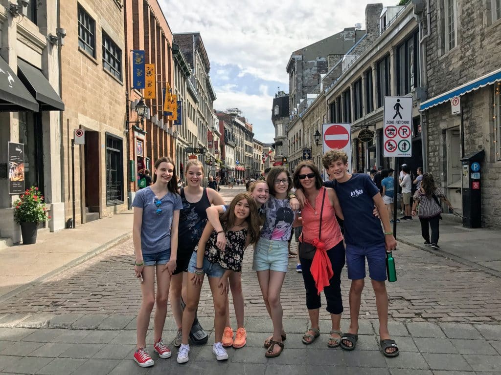 Group of students standing on st paul street in Montreal