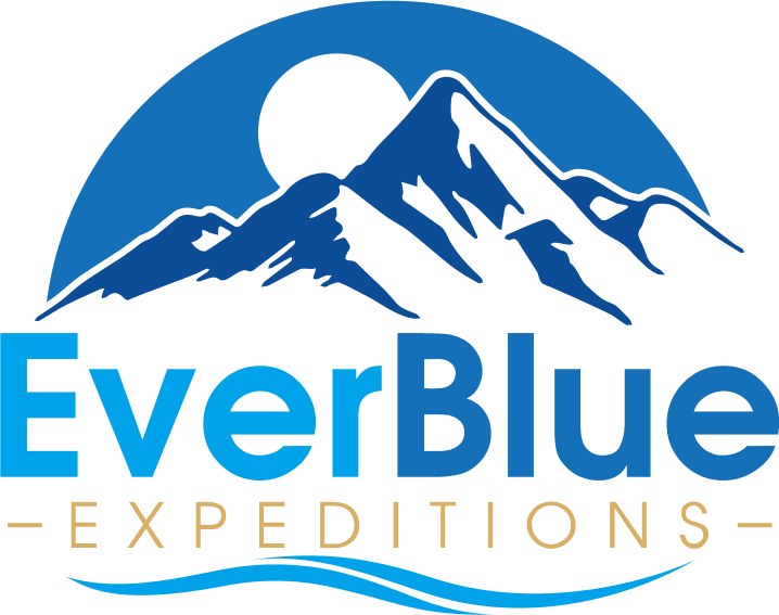 Logo of "EverBlue Expeditions" featuring stylized mountains and a sun, with waves below the text. The color scheme includes shades of blue.