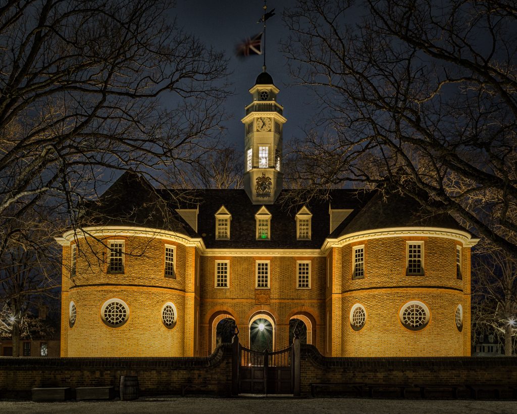 A building with a clock tower and a tower, perfect for your Williamsburg Field Trip.