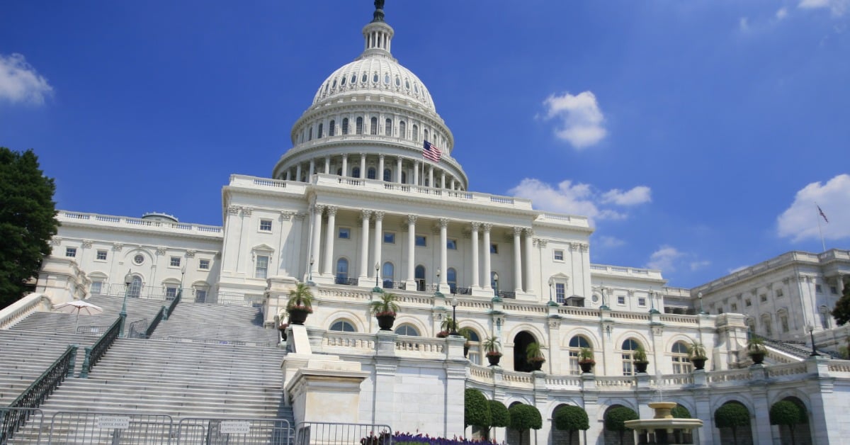 A close-up of the U.S. Capitol building. It's a sunny day outside and there are no tourists walking around.